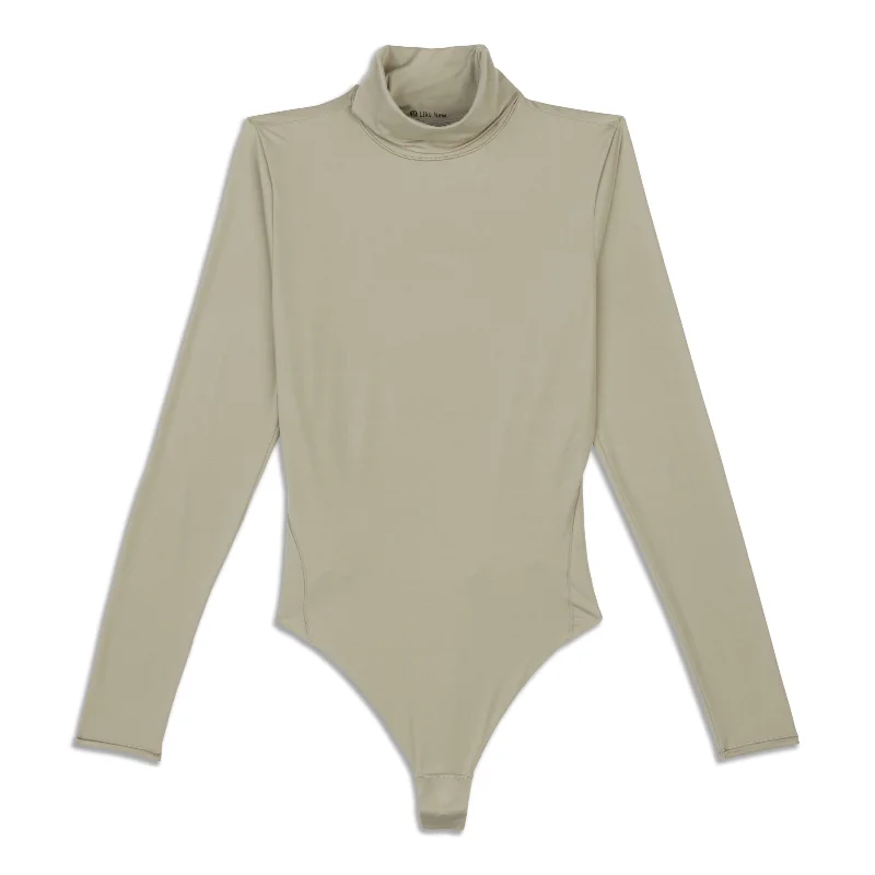 Wundermost Ultra-Soft Turtleneck Bodysuit - Resale Stylish Bodysuit with Cross Front Wundermost Ultra-Soft Turtleneck Bodysuit - Resale Stylish Bodysuit with Cross Front